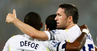 Keane: Celebrates firing Spurs in front