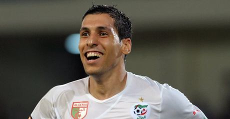 Algeria progress at expense of favourites