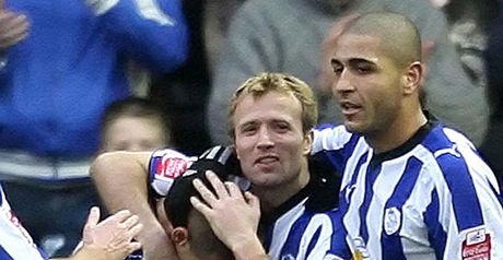 Tudgay (left): Congratulated