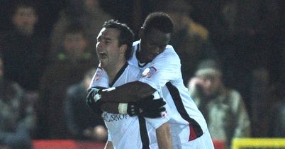 McGleish (l): Celebrates one of his goals for Orient