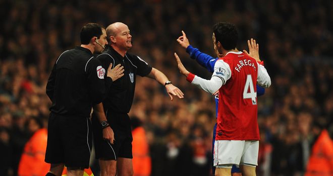 Controversy reigns: Fabregas questions referee Mason after Saha's 24th minute goal