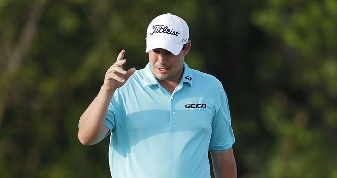 On the charge: Wagner celebrates his birdie at the 16th