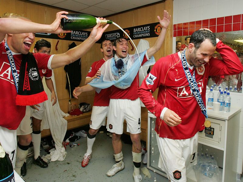 ... and Giggs is showered in champagne
