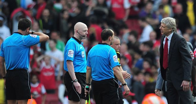 Arsene Wenger (right): The Arsenal manager feels referees would benefit with video technology