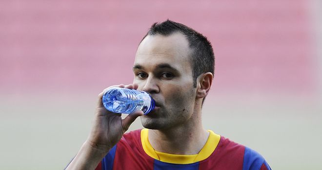 Iniesta: Faces a spell on the sidelines following muscle tear