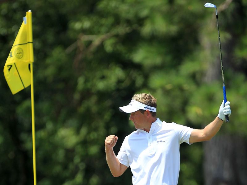 Luke Donald with the fist-clench after holing a greenside chip for birdie at the third.