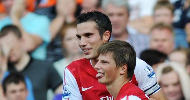 Arshavin: Celebrates with Van Persie after his goal