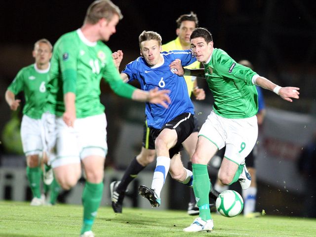 Alexsandr Dmitrijev tangles with Kyle Lafferty.