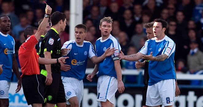 Lee Tomlin: Peterborough striker has apologised after being sent off in the home defeat by Leeds