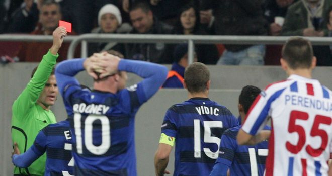 Nemanja Vidic: The Manchester United captain was shown a red card for a challenge on Gabriel Giurgiu