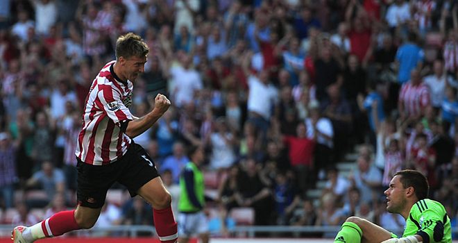 Bendtner: Celebrates his first goal for Sunderland against West Brom
