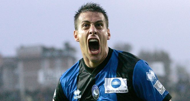 On fire: German Denis bagged a hat-trick for Atalanta in their win over Roma