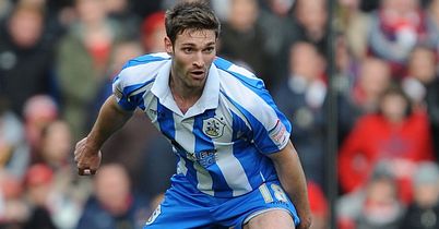 McCombe: Huddersfield exit