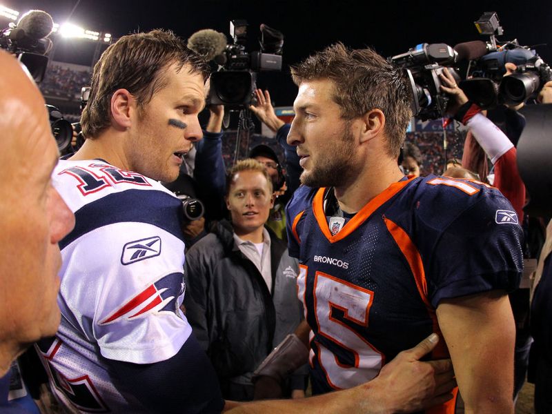 Tebow gets some words of encouragement from Tom Brady.