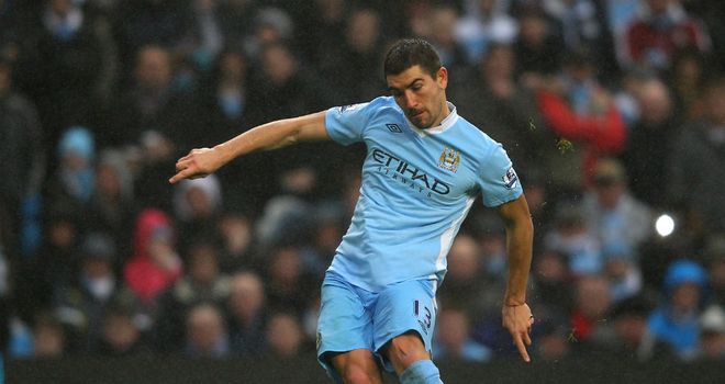Aleksandar Kolarov: Believes the title race will come down to City and United