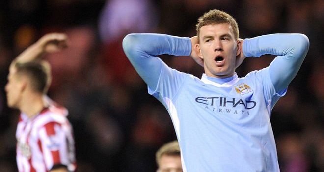Edin Dzeko: Agent claims he would love to play for AC Milan and that it is a strong possibility