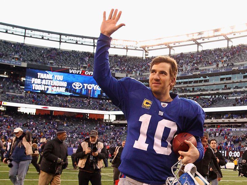 Eli Manning salutes the crowd after leading the Giants to a fine win over Atlanta - next up Green Bay!