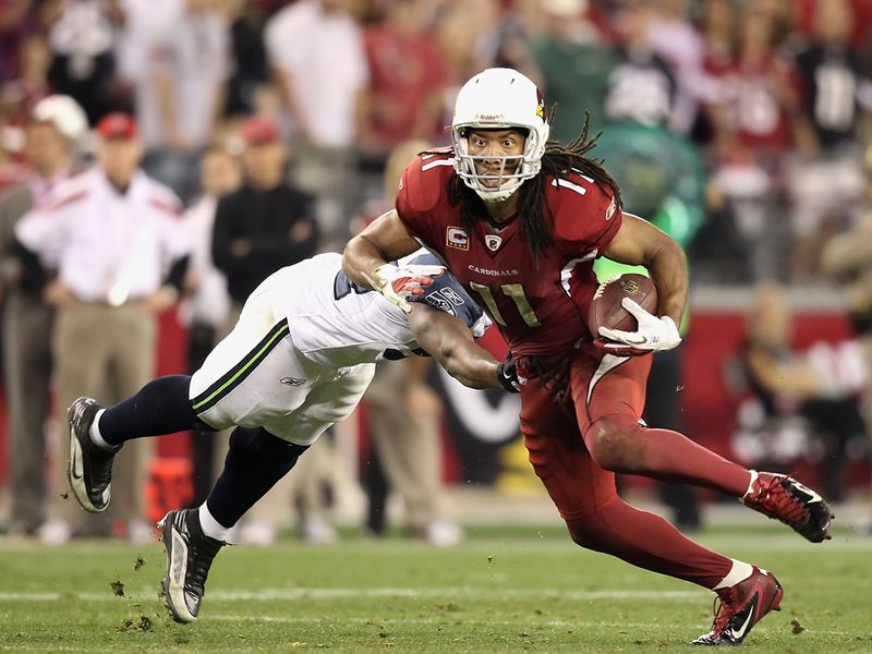 Larry Fitzgerald helps the Cardinals beat Seahawks in overtime.