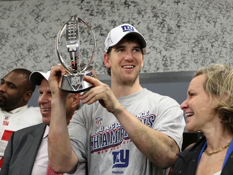 Manning got his hands on the George Halas trophy and advances to a Super Bowl rematch with the Patriots, the team the Giants beat in 2008.