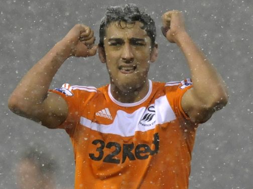 Neil Taylor: Extends his stay at Swansea