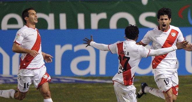 Rayo Vallecano players celebrate after staying up in the Primera Liga