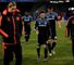 Beaten and bowed: Torres, Essien, Mata and Cahill depart the Stadio Sao Paolo