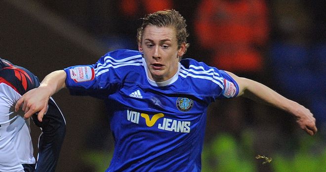 Elliott Hewitt: Set for talks with Ipswich after Macclesfield agreed fee