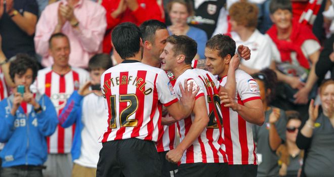 Billy Sharp: Celebrates his double against former club Doncaster with his team-mates