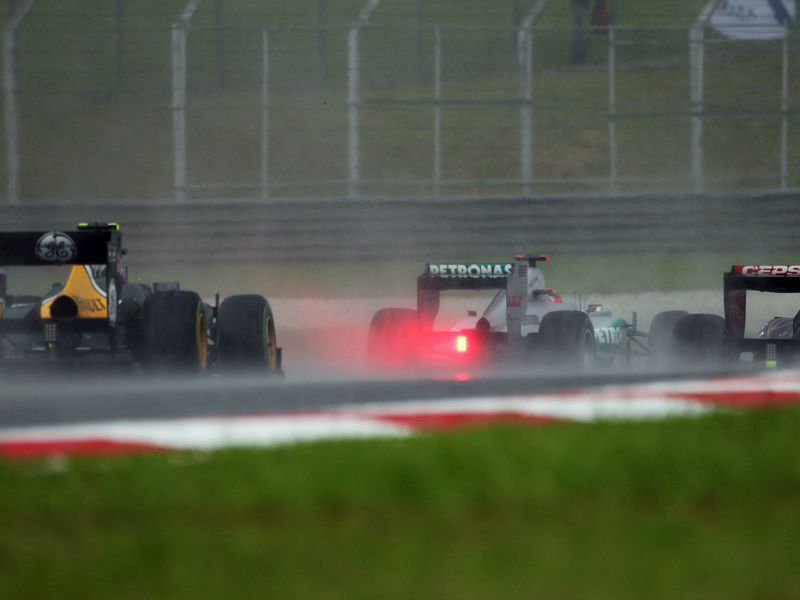 After spinning Schumacher mixes it at the back of the field