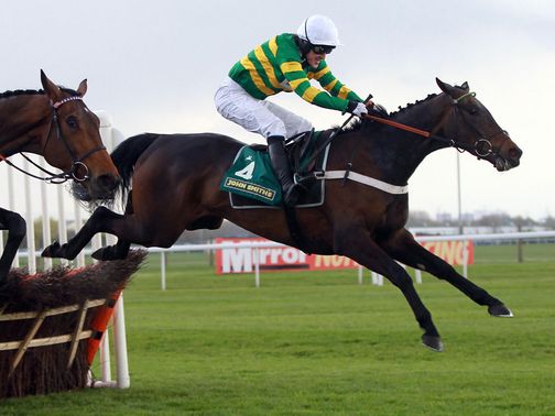 Darlan and Tony McCoy in action at Aintree in April