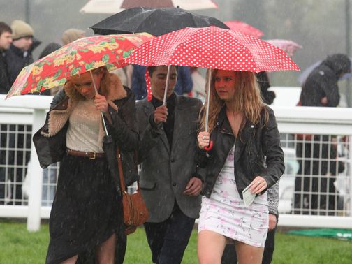 Sandown racegoers take shelter