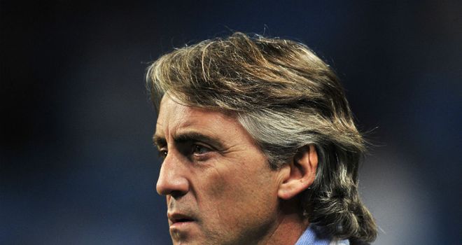 Roberto Mancini and Sir Alex Ferguson: The pair clashed in the second half at the Etihad Stadium