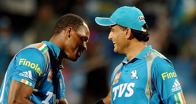 Marlon Samuels (left) and Sourav Ganguly: Pune Warriors skipper defended his bowler