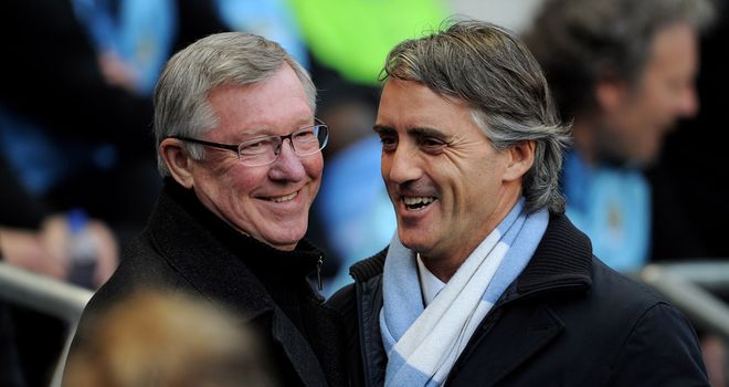 The Manchester managers Sir Alex Ferguson and Roberto Mancini set for battle at Old Trafford