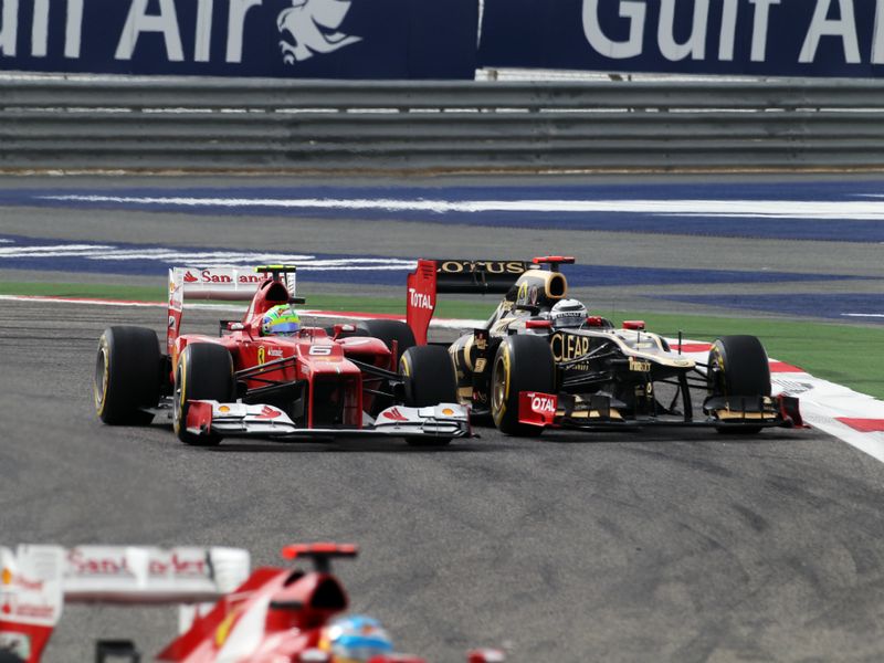 Felipe Massa battles Kimi Raikkonen