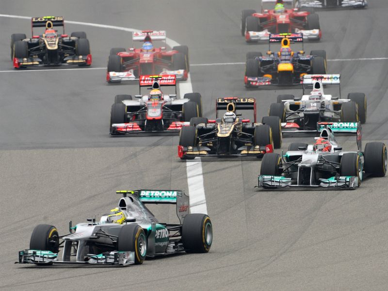 Rosberg leads into turn one