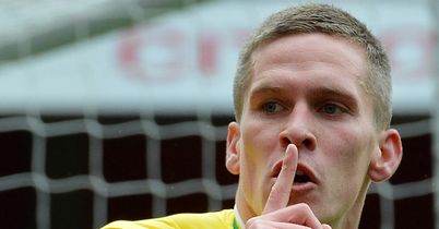 Steve Morison secured a 3-3 draw for Norwich at Arsenal in Saturday's only Barclays Premier League game.