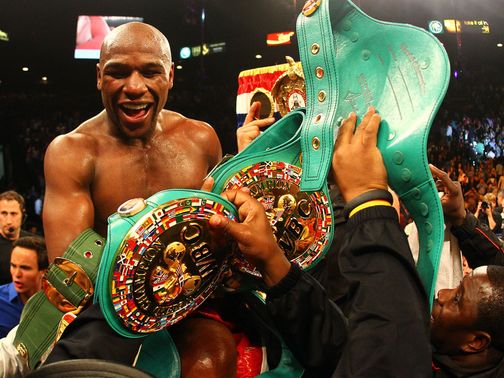 Floyd Mayweather celebrates his win over Miguel Cotto