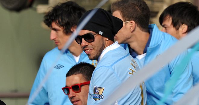 Carlos Tevez: Displayed a banner saying 'RIP Fergie'