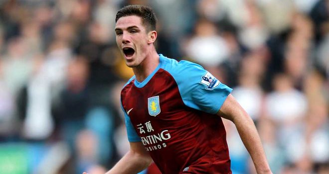Ciaran Clark: The midfielder celebrates his opening goal of the game
