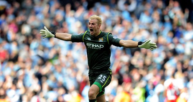 Joe Hart celebrates Sergio Aguero's dramatic winner against QPR