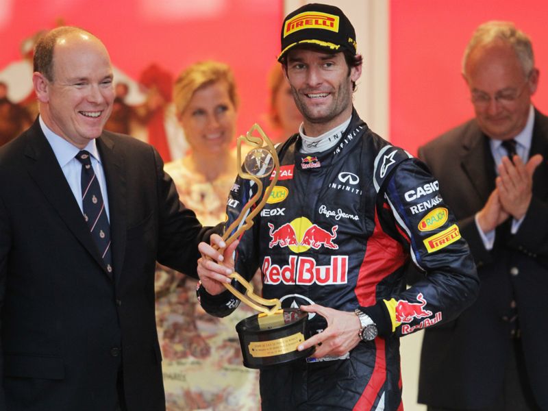 Prince Albert gives Mark Webber his trophy