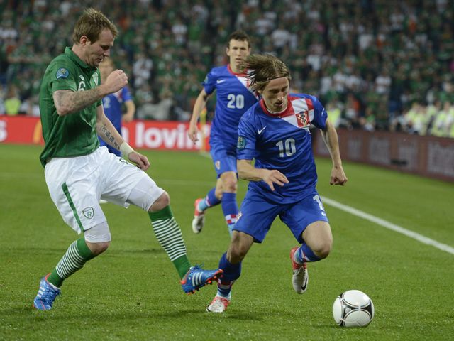Modric uses his skill to get past Whelan