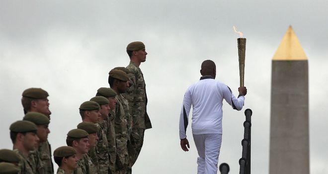 War hero Johnson Beharry with the Olympic Torch