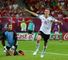 Lars Bender: Celebrates his winner which saw Germany take maximum points