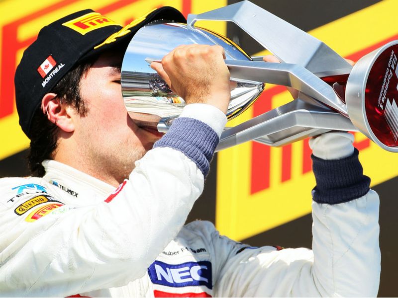 Sergio Perez celebrates third