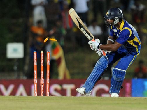 Kumar Sangakkara is bowled for 133