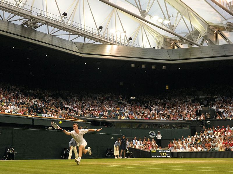 In another first, Andy Murray plays against Stanislas Wawrinka in the first Wimbledon match under the lights of Centre Court.
