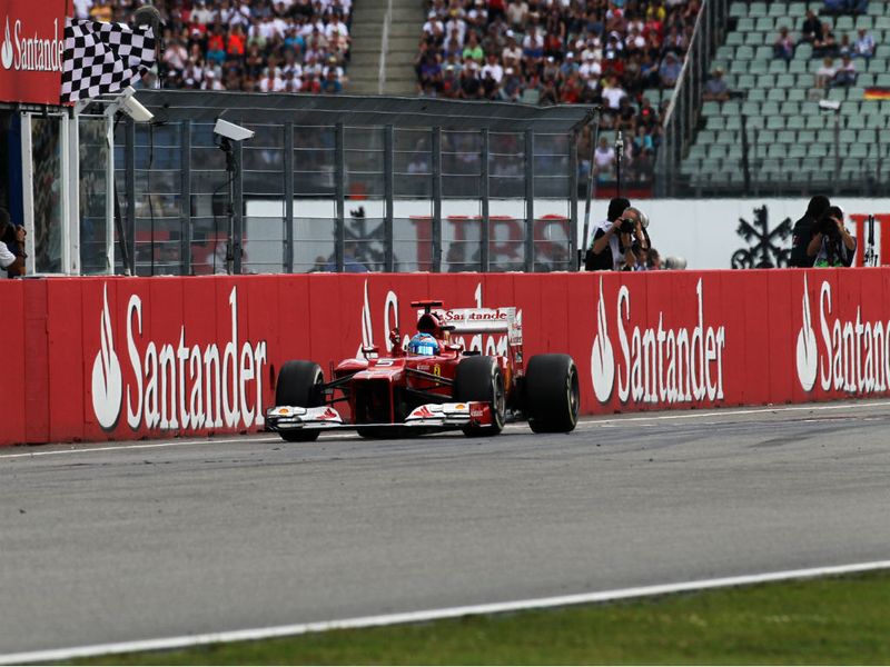 Alonso takes the chequered flag