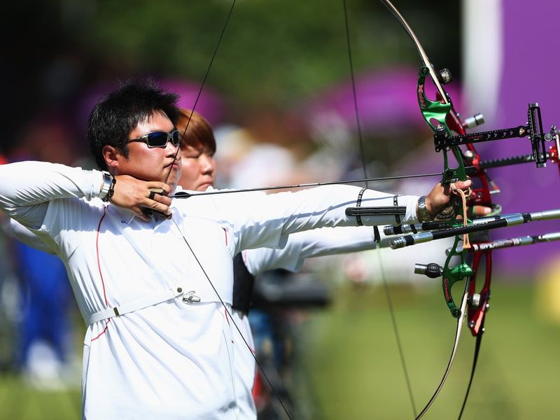 Archer Im Dong Hyeun of South Korea broke a World Record before the Olympic ceremony had even begun. He is legally blind in one eye